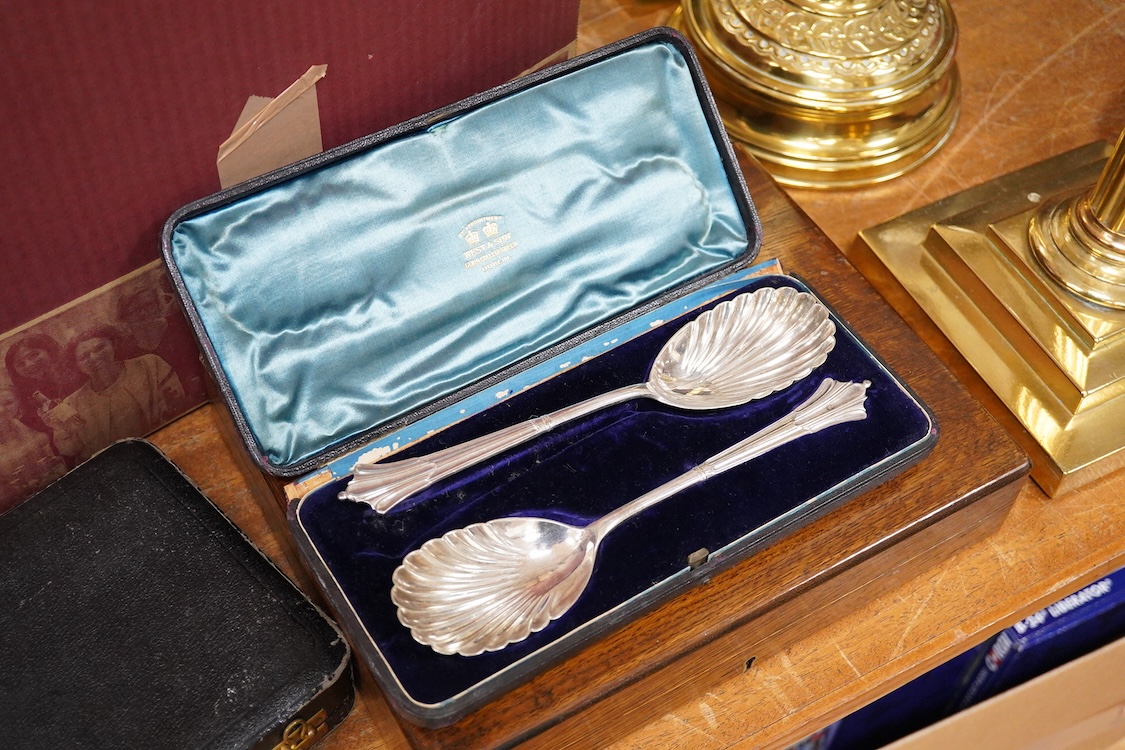 A quantity of assorted plated items including entrée dishes, flatware and mugs.